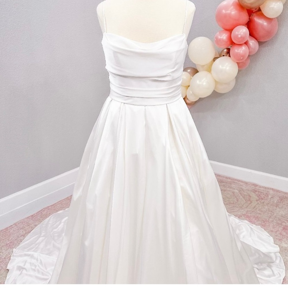 Maggie Sottero Scarlet in diamond white. Size 10, unhemmed, unaltered.